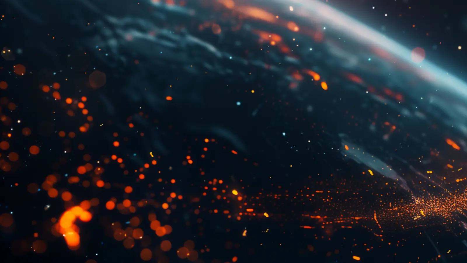 Orange embers scattered over the dark curve of a planet